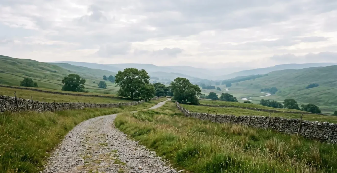 Wide environmental shot of a winding country path through British countryside representing a lifetime planning journey